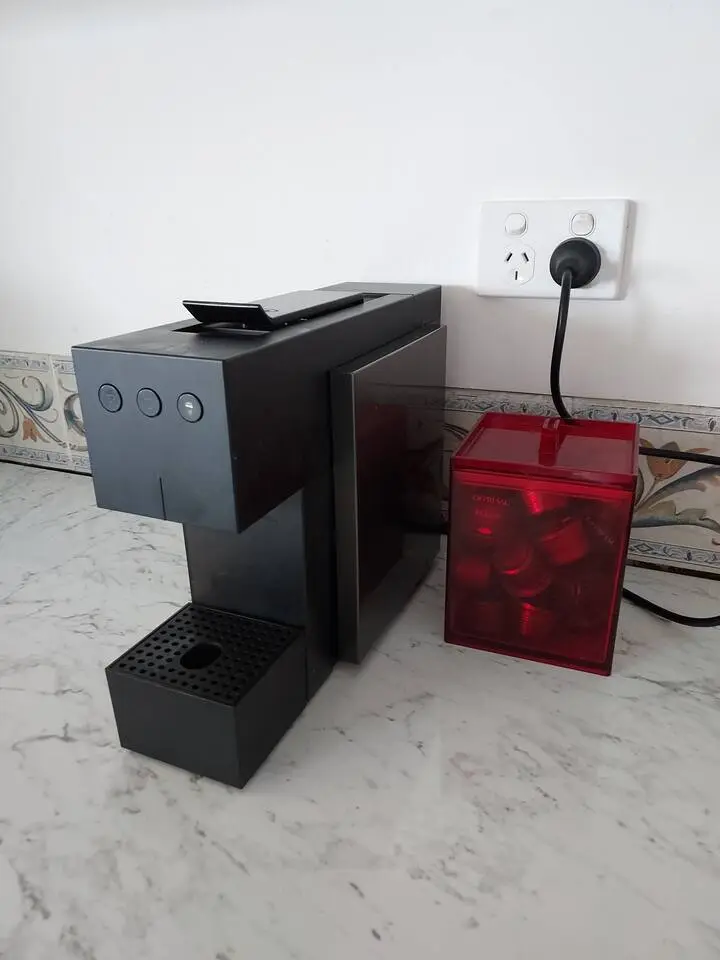 Nespresso machine with pods provided