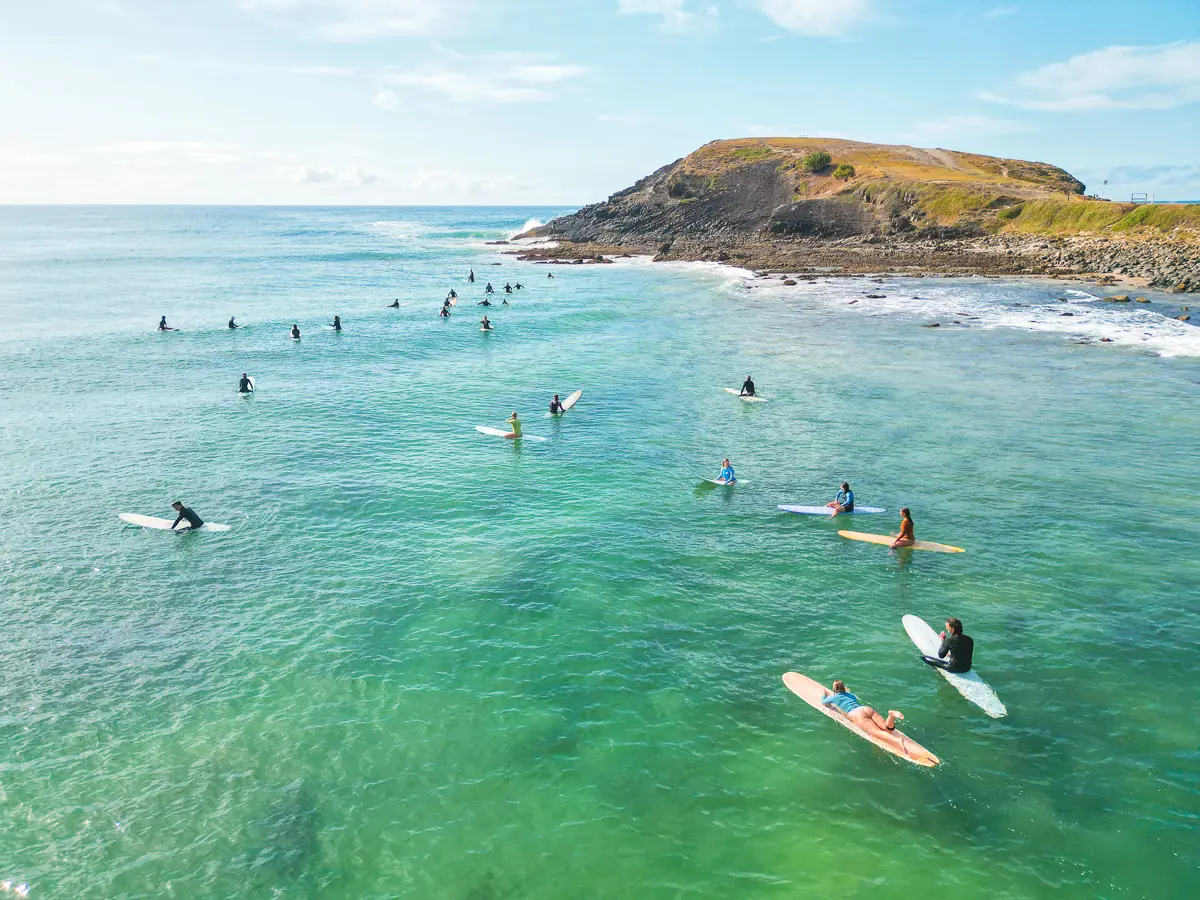 Surfers at the Crescent Head point break, the National Surfing Reserve