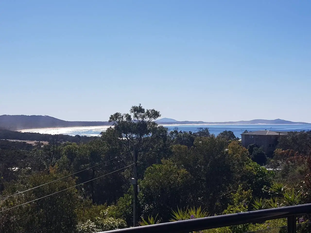 The deck at The Deck, Crescent Head at sunrise — the view that's waiting at the end of the drive