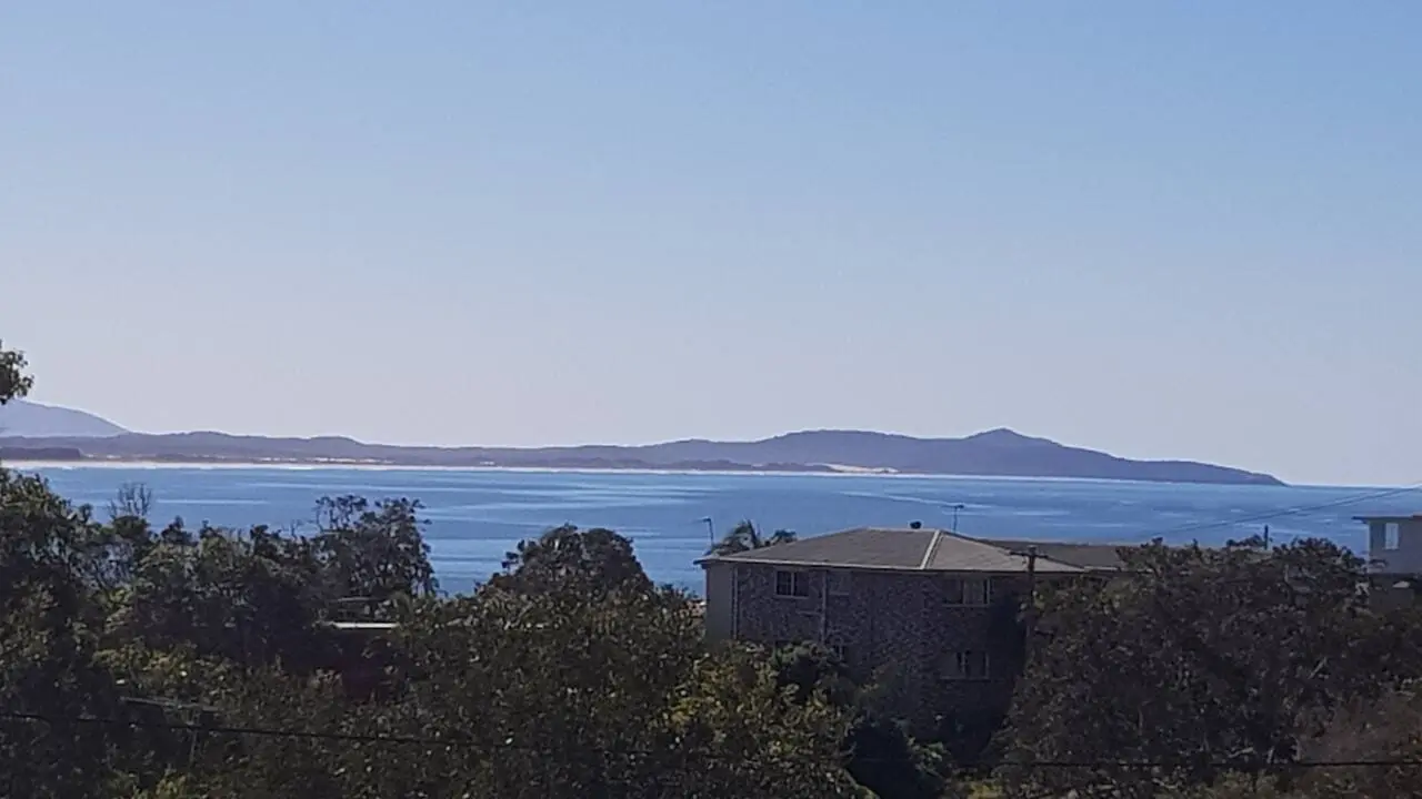 The ocean horizon and the bay off Crescent Head, NSW: whales pass close to the headland in season